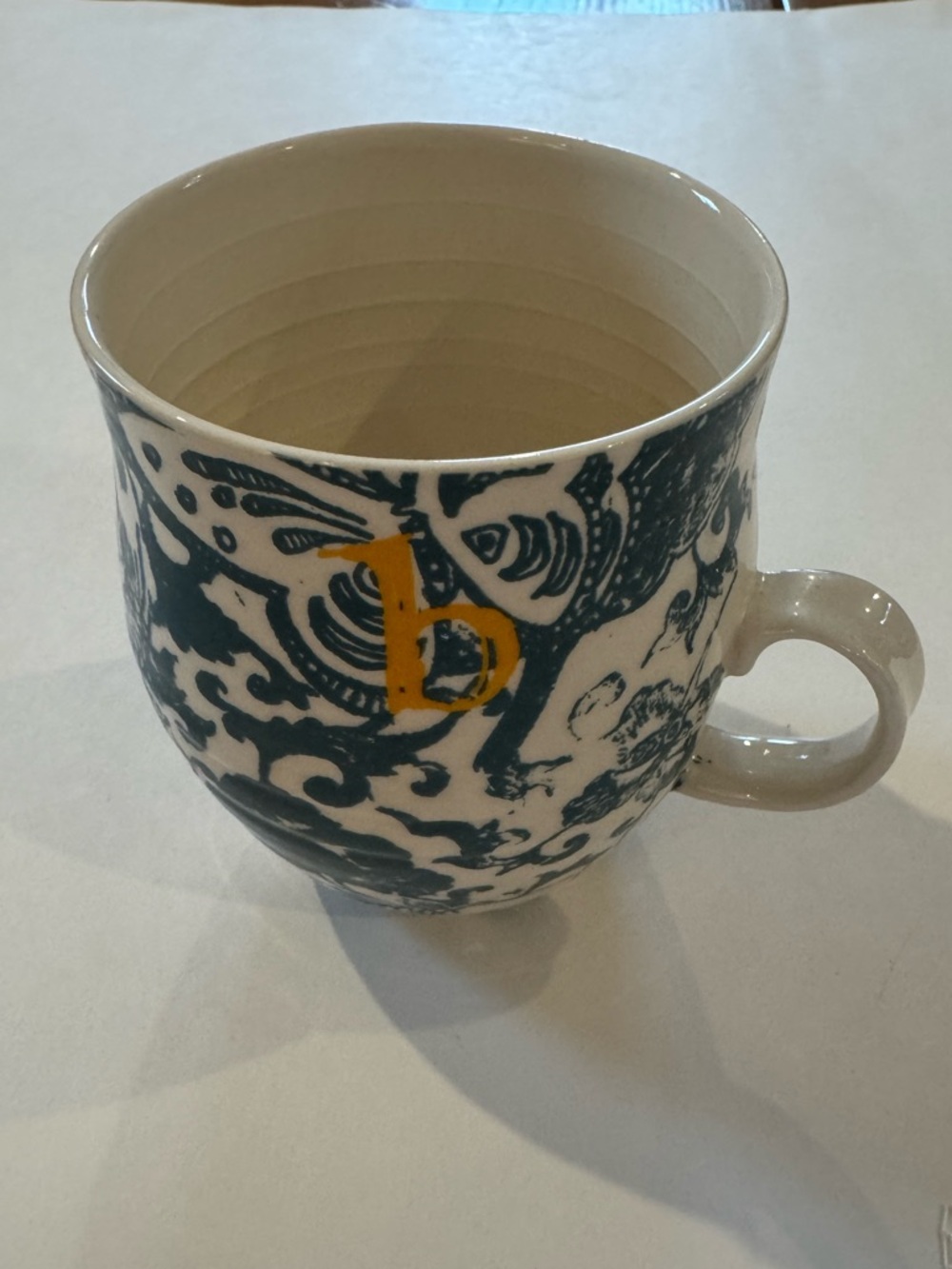 Anthropologie Dark Blue and White Floral Ceramic Mug with ‘B’ Initial